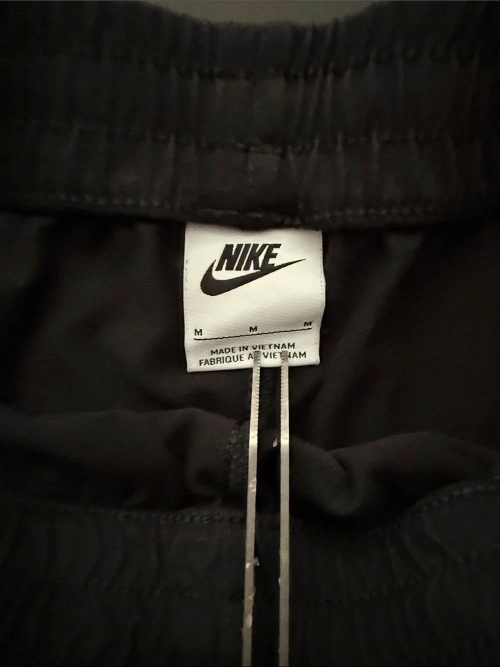 Nike Men's Black Athletic Shorts with White Swoosh